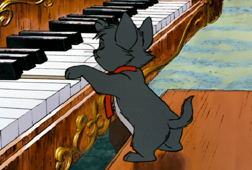 Анимированная открытка Котёнок играет на пианино